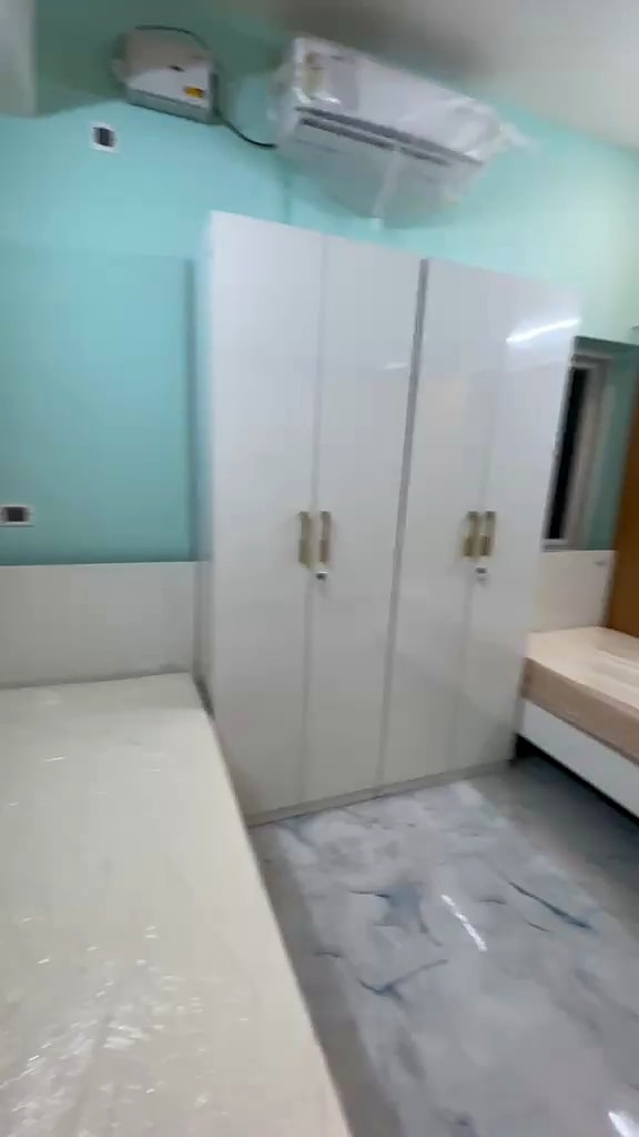 Double sharing room — wardrobe front
